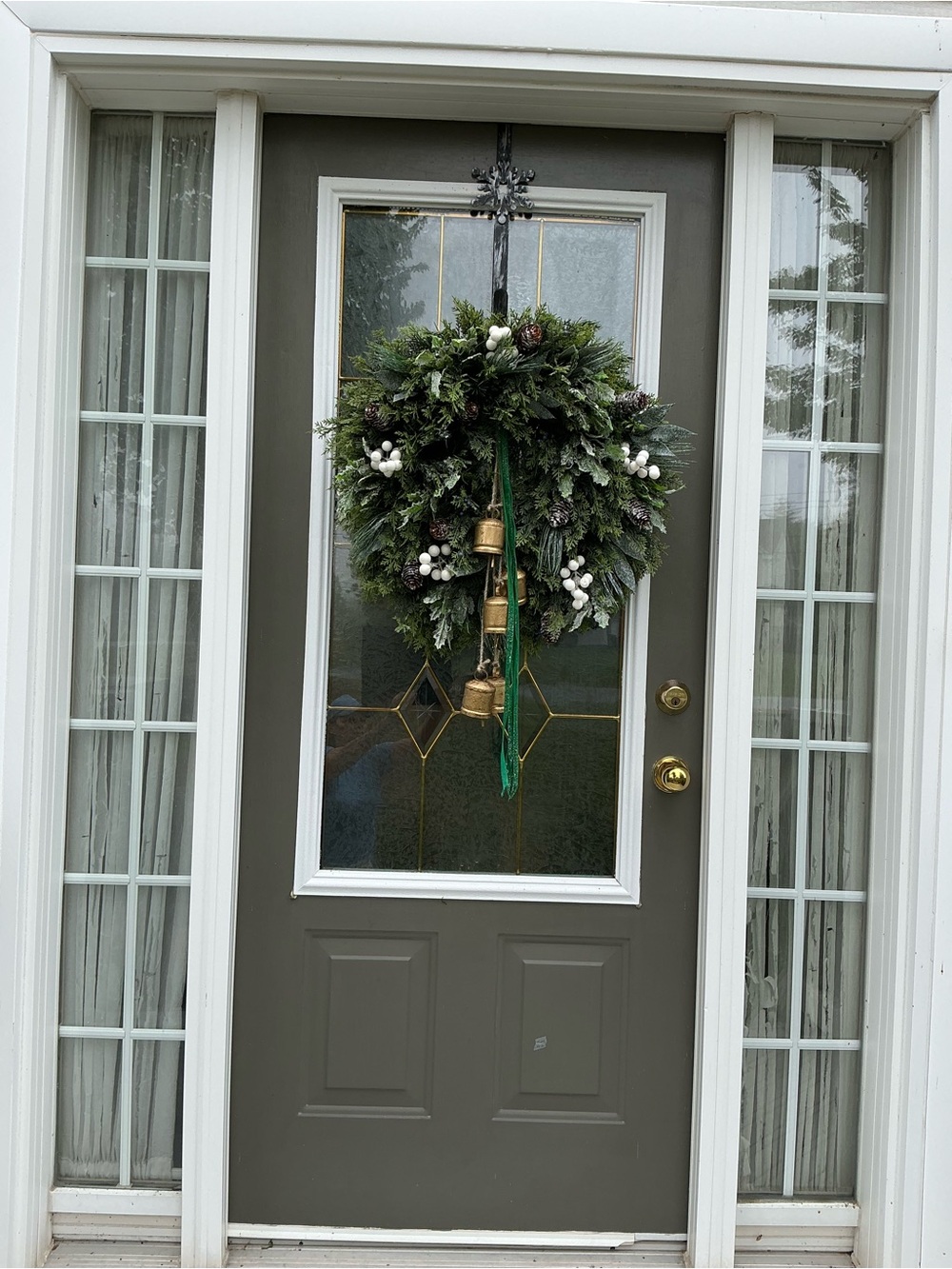 Green Evergreen Holiday Wreath with White Berries and Gold Bells